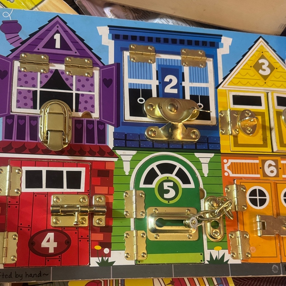 Melissa & Doug Colorful Lock and Latch Board